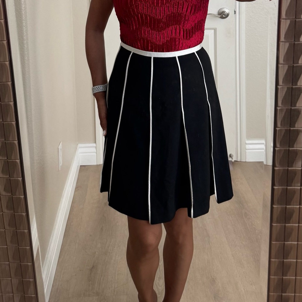 INC skirt; black with white trims
